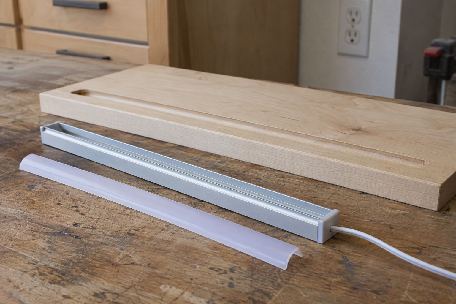 Design visualization: Unlit cabinet lighting profile, opal diffuser and routed channel sample