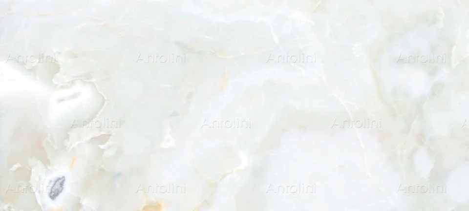 Antolini Onice Bianco Extra closeup with pale white crystalline movement