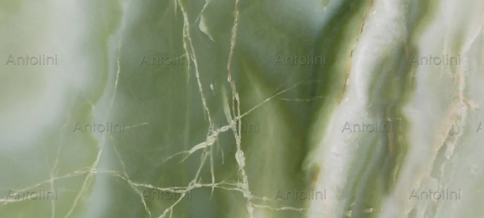 Antolini Onice Verde Persiano Top cross-cut closeup with green and warm mineral movement