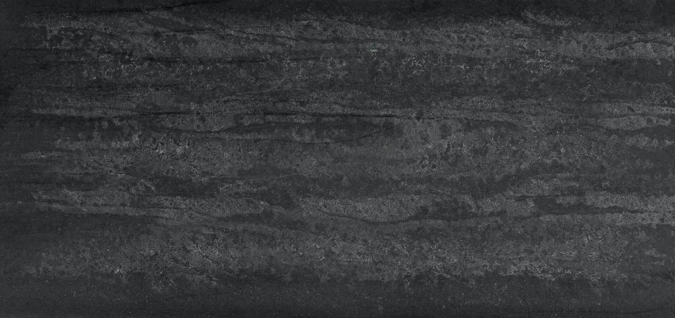 Black Tempal charcoal slab with softly layered lighter mineral movement